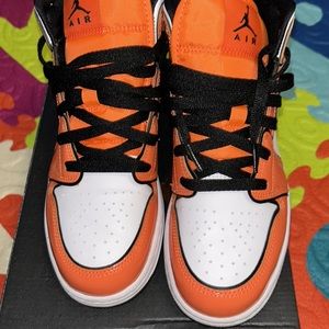 orange and white jordan 1s